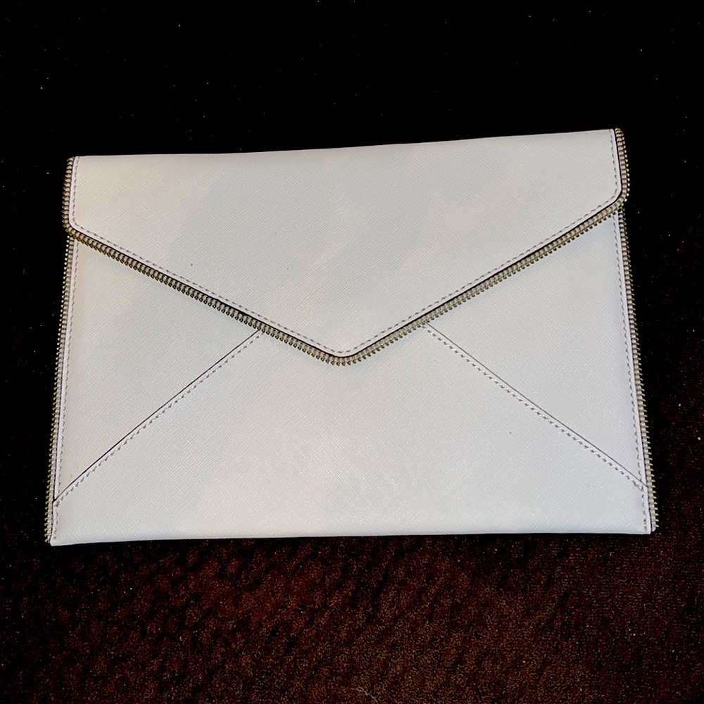 Rebecca Minkoff envelope clutch never been used. Excellent condition.
